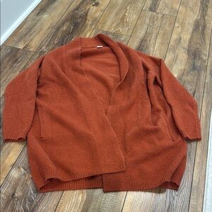 Beautiful and soft women’s rust color cardigan